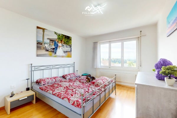 Mehrfamilienhaus mit Entwicklungspotenzial und zusätzlicher Bauparzelle in Heitenried 8