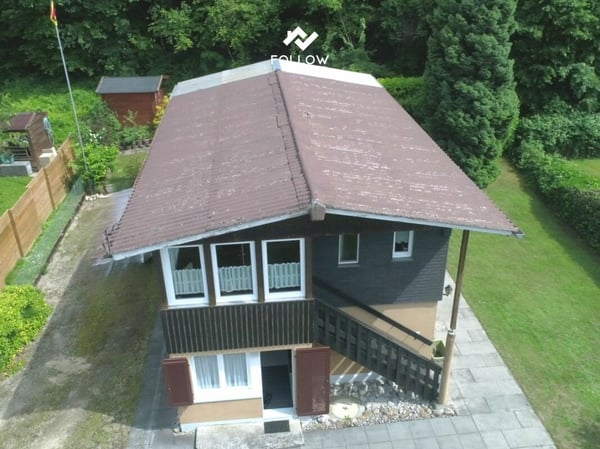 Gepflegtes Wohnhaus mit Umschwung und Ausbaupotential an ruhiger Lage am Neuenburgersee 11