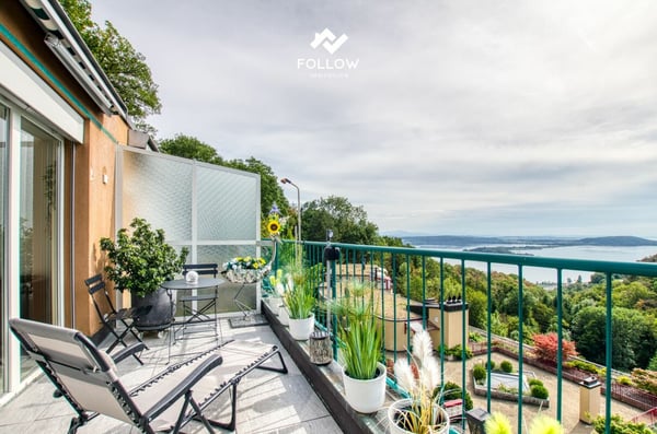 Panoramablick über den Bielersee: Modernisierte Attika-Traumwohnung in Twann 2