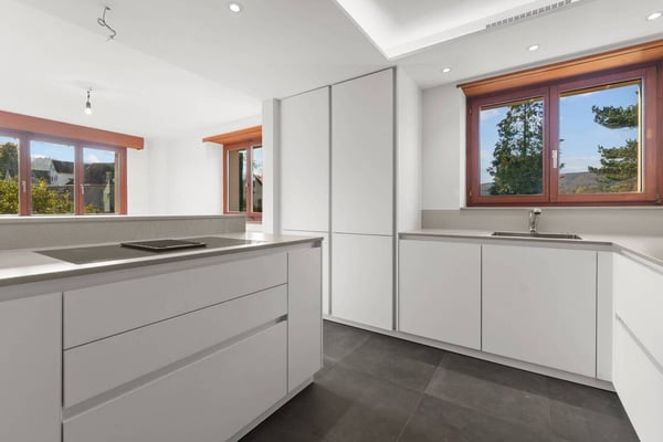 Maisonettewohnung mit Cheminée, Gartensitzplatz und 2 Aussenparkplätzen! 4
