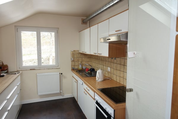 3.5 pièces tout confort dans petite maison avec spacieux jardin commun 3