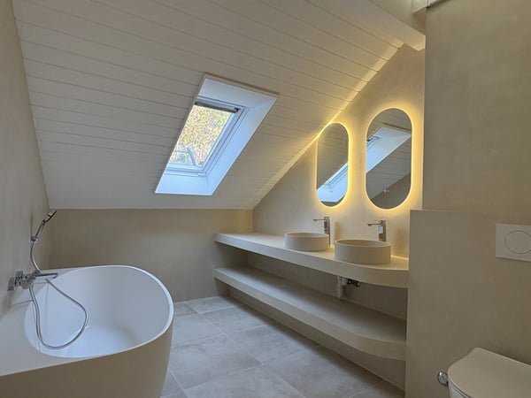 Appartement de 7.7 pièces en duplex 13