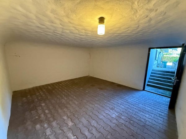 Freistehendes 5,5-Zimmer-Einfamilienhaus mit 2-Zimmer-Einlegerwohnung 23