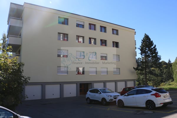 Place de parc grillagée dans un garage collectif 1