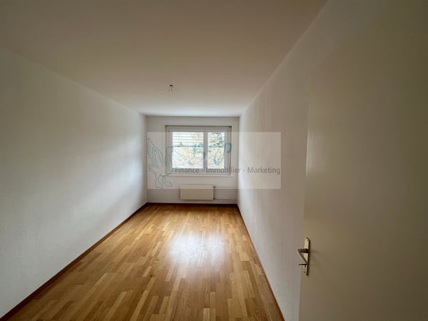 Appartement de 4.5 pièces dans un quartier calme et verdoyant. 3