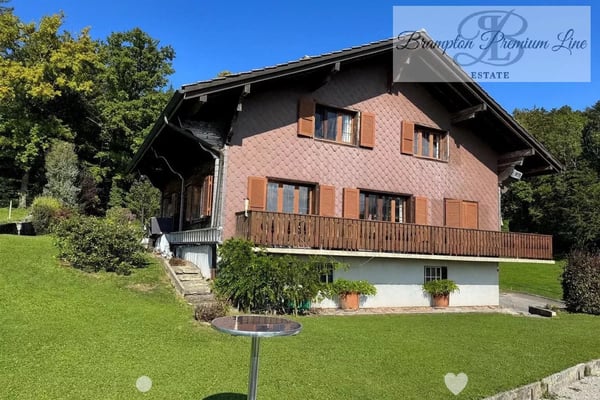 Charaktervolles 6,5-Zimmer-Chalet in Remaufens 1