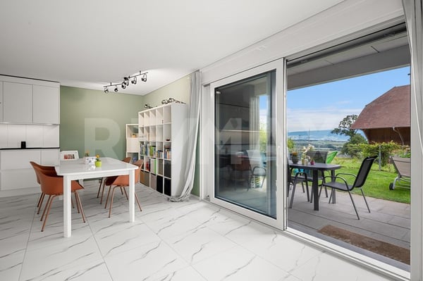 Appartement 4.5 pièces avec grand jardin privatif  confort moderne et cadre verdoyant à Russy 2