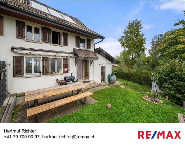 Découvrez cette charmante maison mitoyenne avec vue imprenable sur les Préalpes ! 1