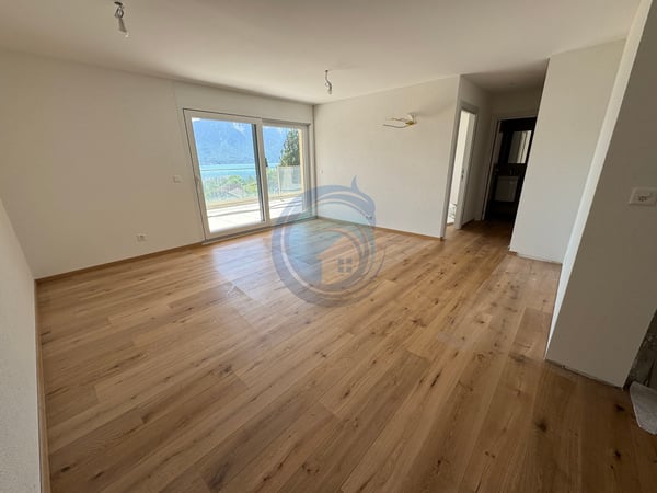 APPARTEMENT NEUF DE 4,5 PIÈCES AVEC VUE PANORAMIQUE SUR LE LAC 3