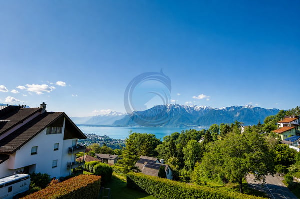 SOMPTUEUX APPARTEMENT EN DUPLEX DE 5.5 PIÈCES AVEC VUE SUR LE LAC 2