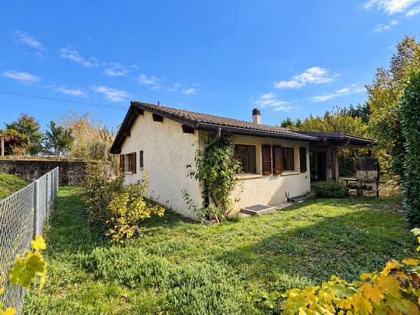 Charmante maison individuelle avec grand jardin dans un environnement verdoyant à Boudry 1