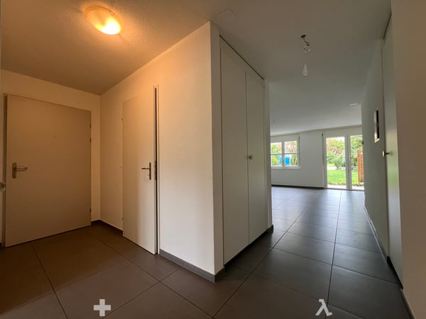 Wohnung mit Gartensitzplatz / Appartement avec terrasse 7