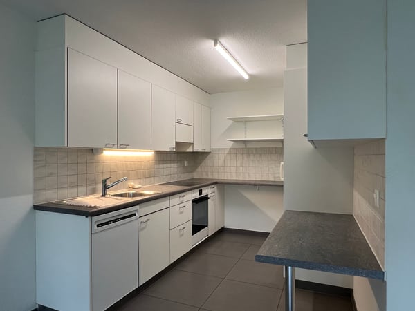 Wohnung mit Gartensitzplatz / Appartement avec terrasse 3