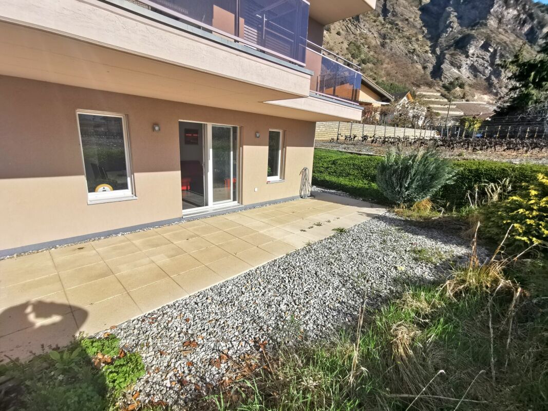 Appartement 2.5 pièces avec jardin dans immeuble résidentiel