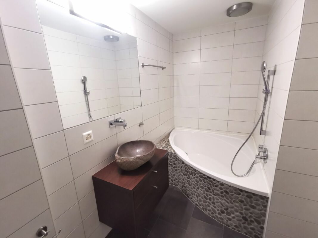 Appartement 2.5 pièces avec jardin dans immeuble résidentiel