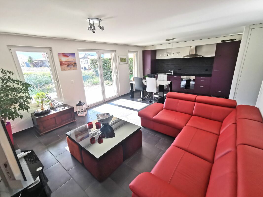Appartement 2.5 pièces avec jardin dans immeuble résidentiel