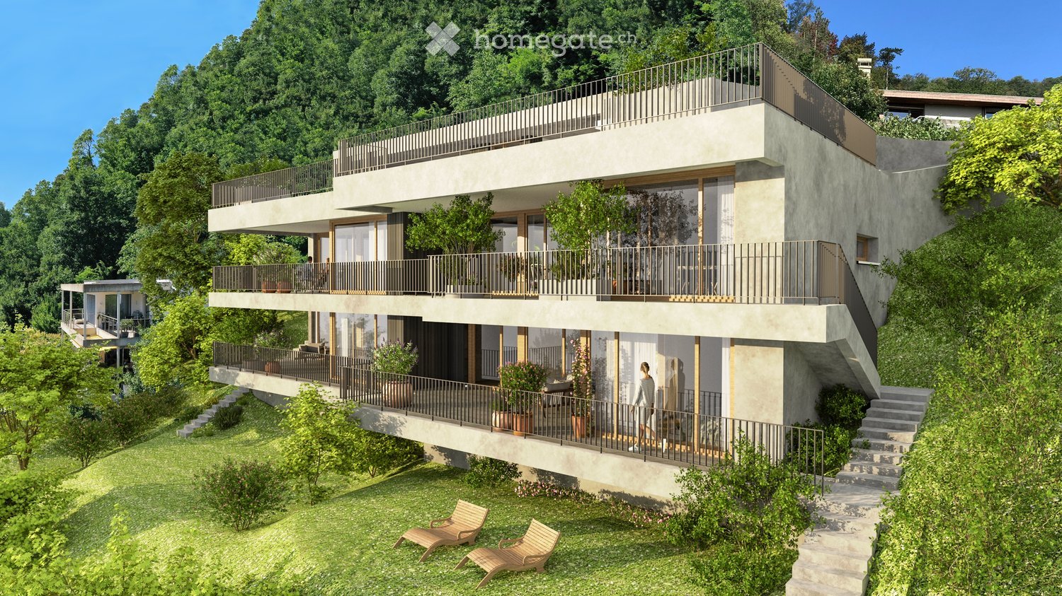 Modern 3-story house with multiple balconies, nestled in the forest, concrete and glass construction
