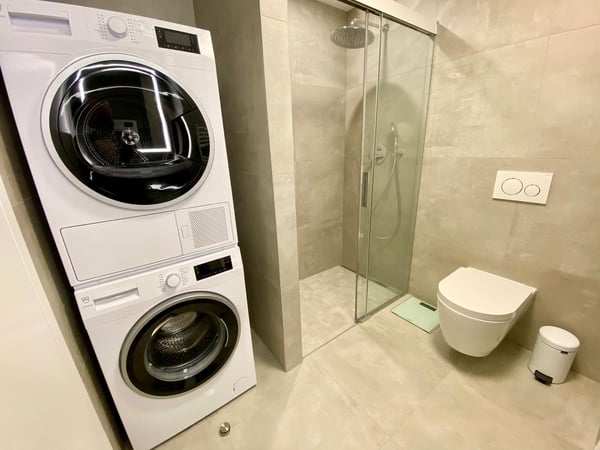 Affittasi 1.5 locali Minergie di standing superiore con grande giardino, zona barbecue + Jacuzzi 16