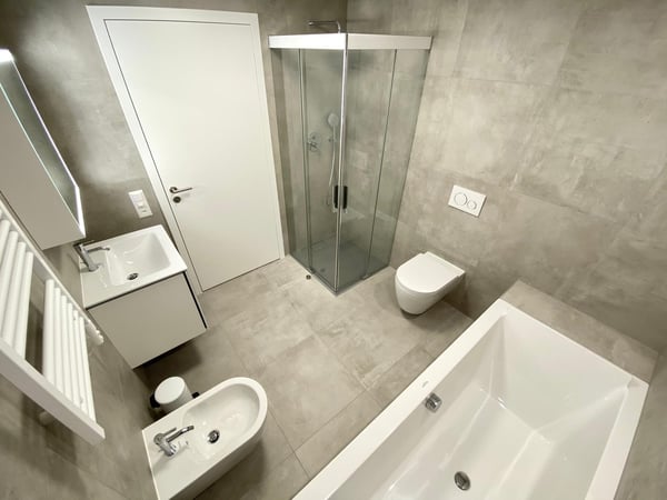 Affittasi 1.5 locali Minergie di standing superiore con grande giardino, zona barbecue + Jacuzzi 8