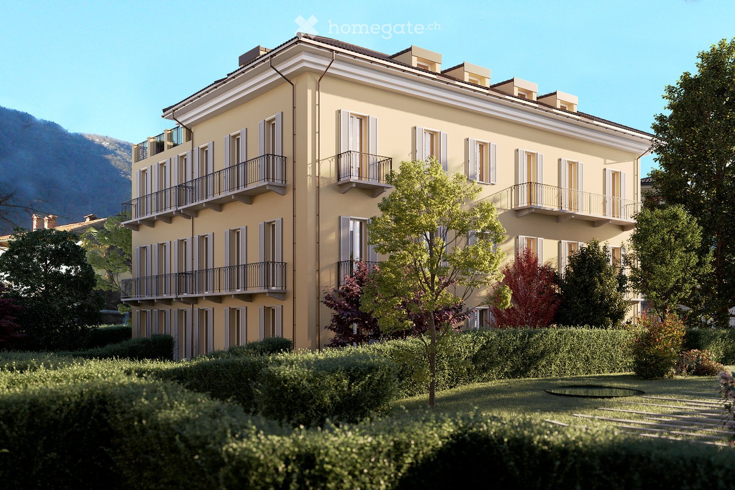 3-story building with balconies and windows