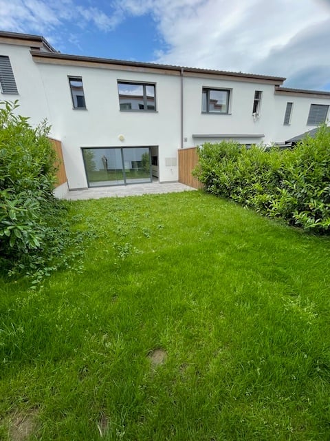 White house, glass doors, windows, front garden