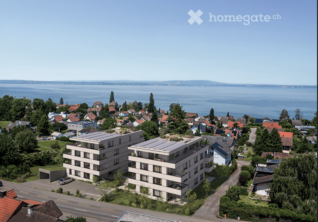 two residential buildings, rooftop terrace, solar panels, green roofs, overlooking the sea