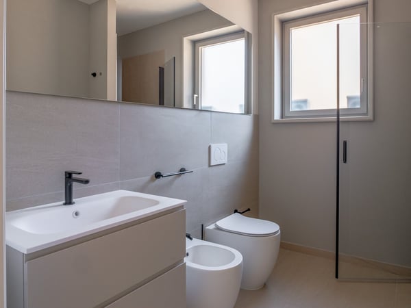 Affittasi 1.5 locali nuovo con giardino e completamente arredato 3