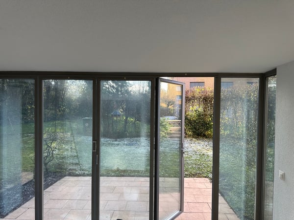 Exklusive 1.5-Zimmer Gartenwohnung mit Wintergarten & Cheminée 1