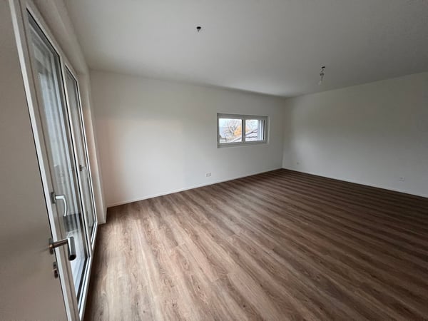 Moderne 1.5-Zimmer-Neubau-Wohnung in Auw 1