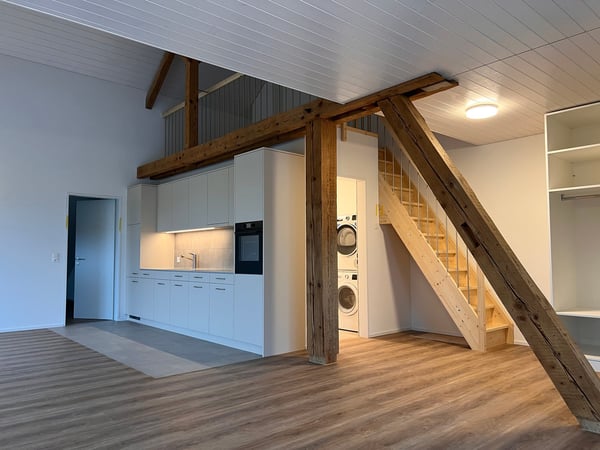 Moderne 1.5-Zimmer-Neubau-Wohnung in Auw 1