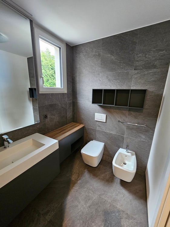 Moderno attico di 1.5 locali a Morbio Inferiore con ampio garage e posto auto esterno inclusi 3