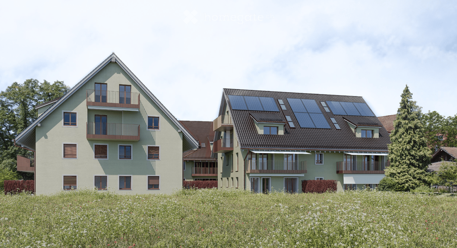 Two townhouses, Solar panels on the roof, balconies, white windows, brick rooftops