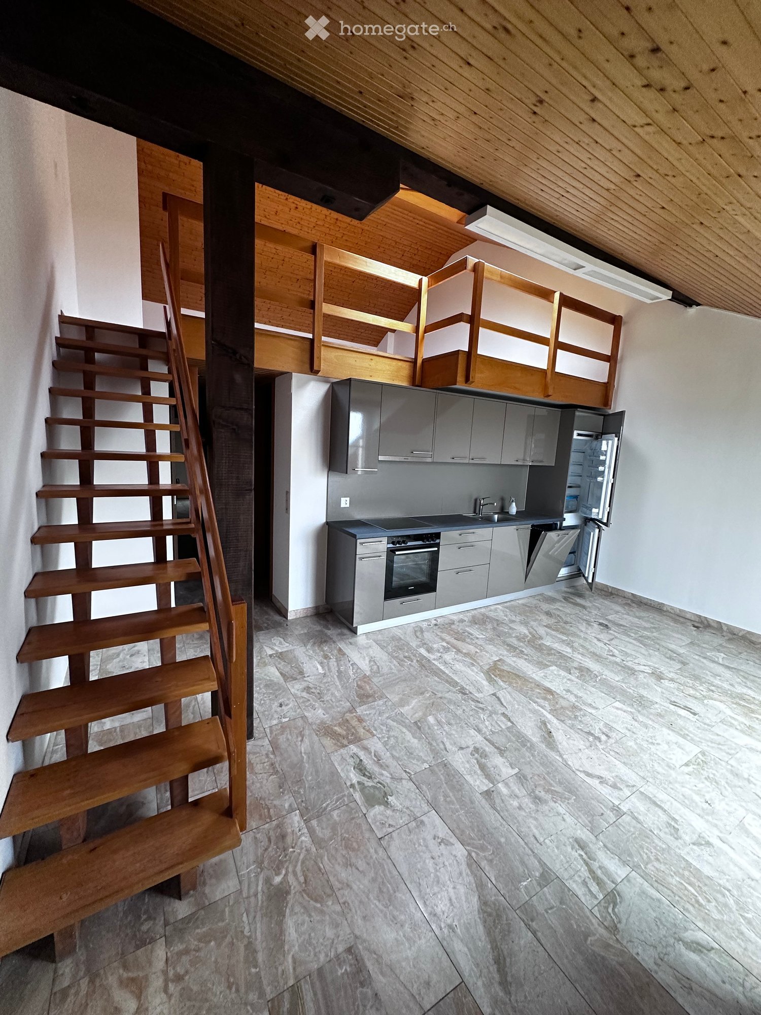 open kitchen, wooden stairs, tiled floor, wooden ceiling, kitchen appliances