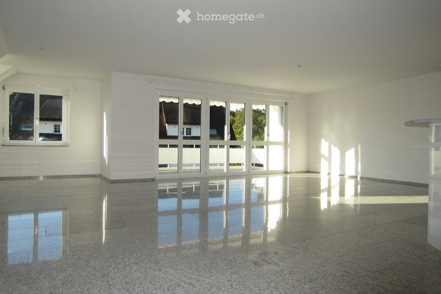 empty room, white walls, large windows, balcony, tiled floor, view of outside