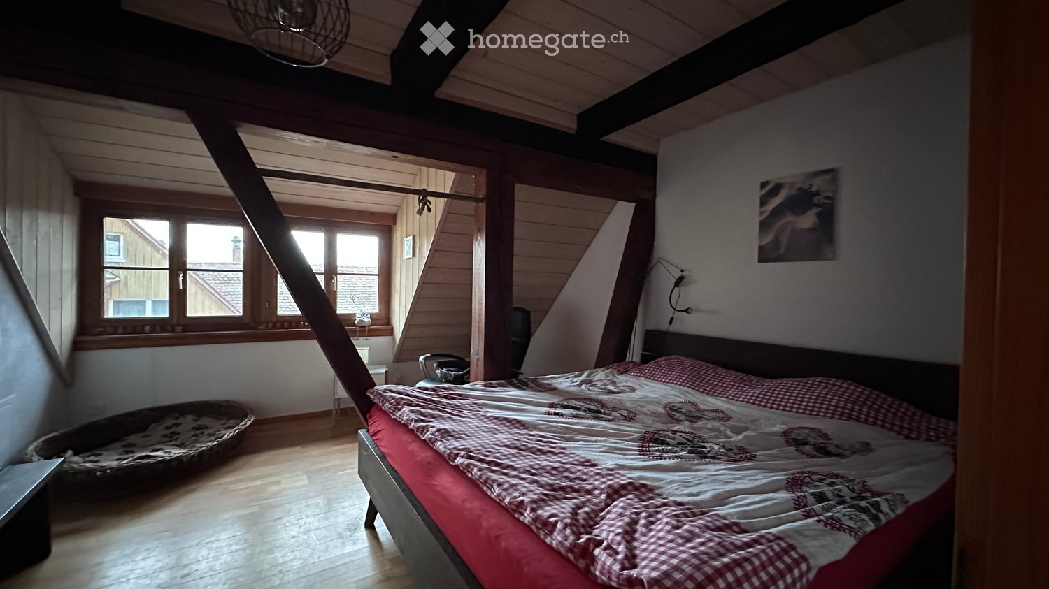 wooden floor, wooden beams, bed, window, dog bed, lamp