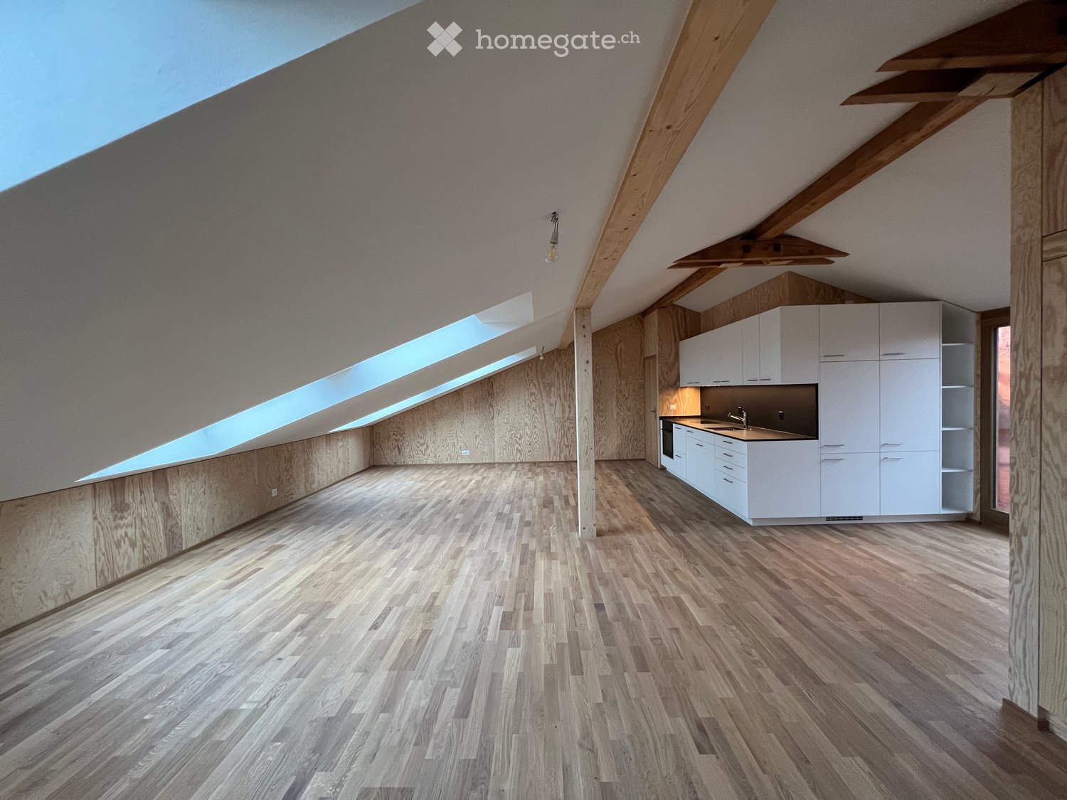 empty room, wooden floor, wooden walls, kitchen, skylights
