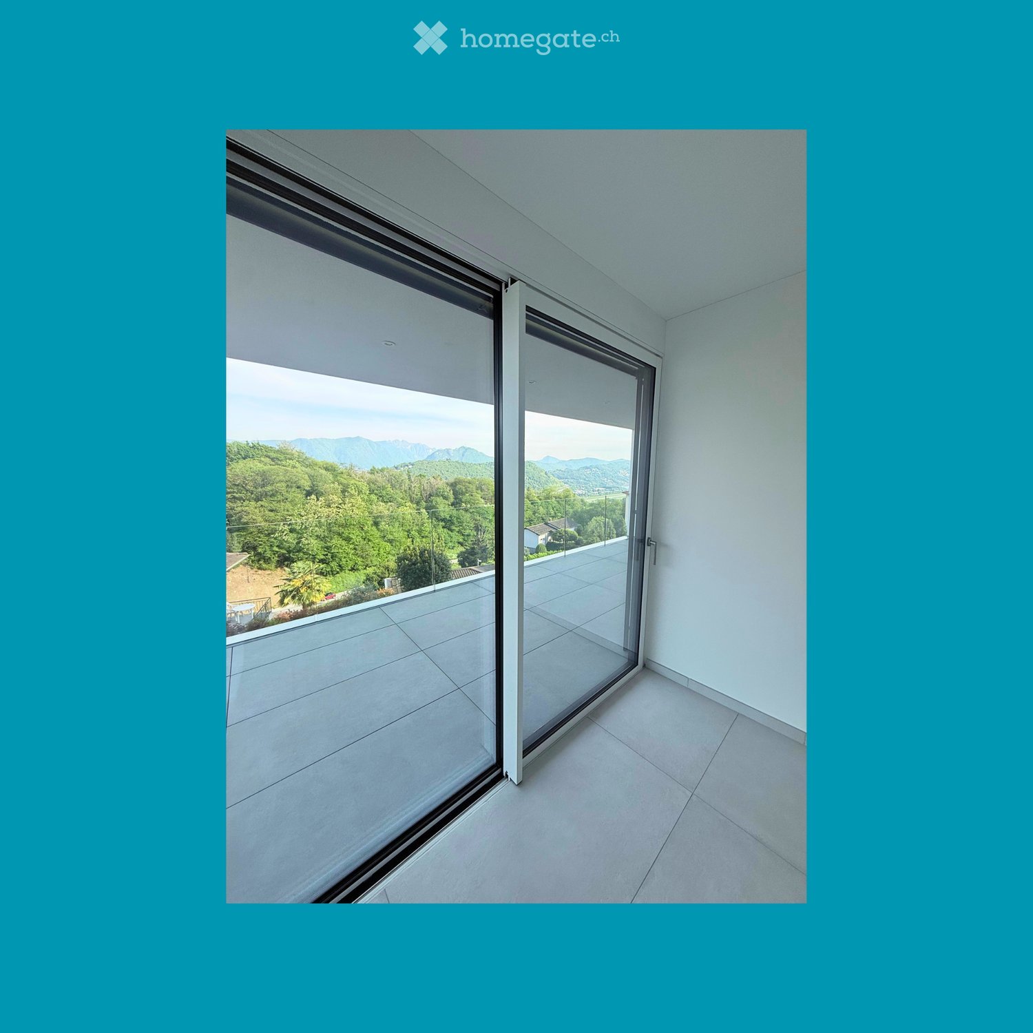 Unfurnished Room. An empty room with sliding glass doors leading to a balcony with a view of the mountains.