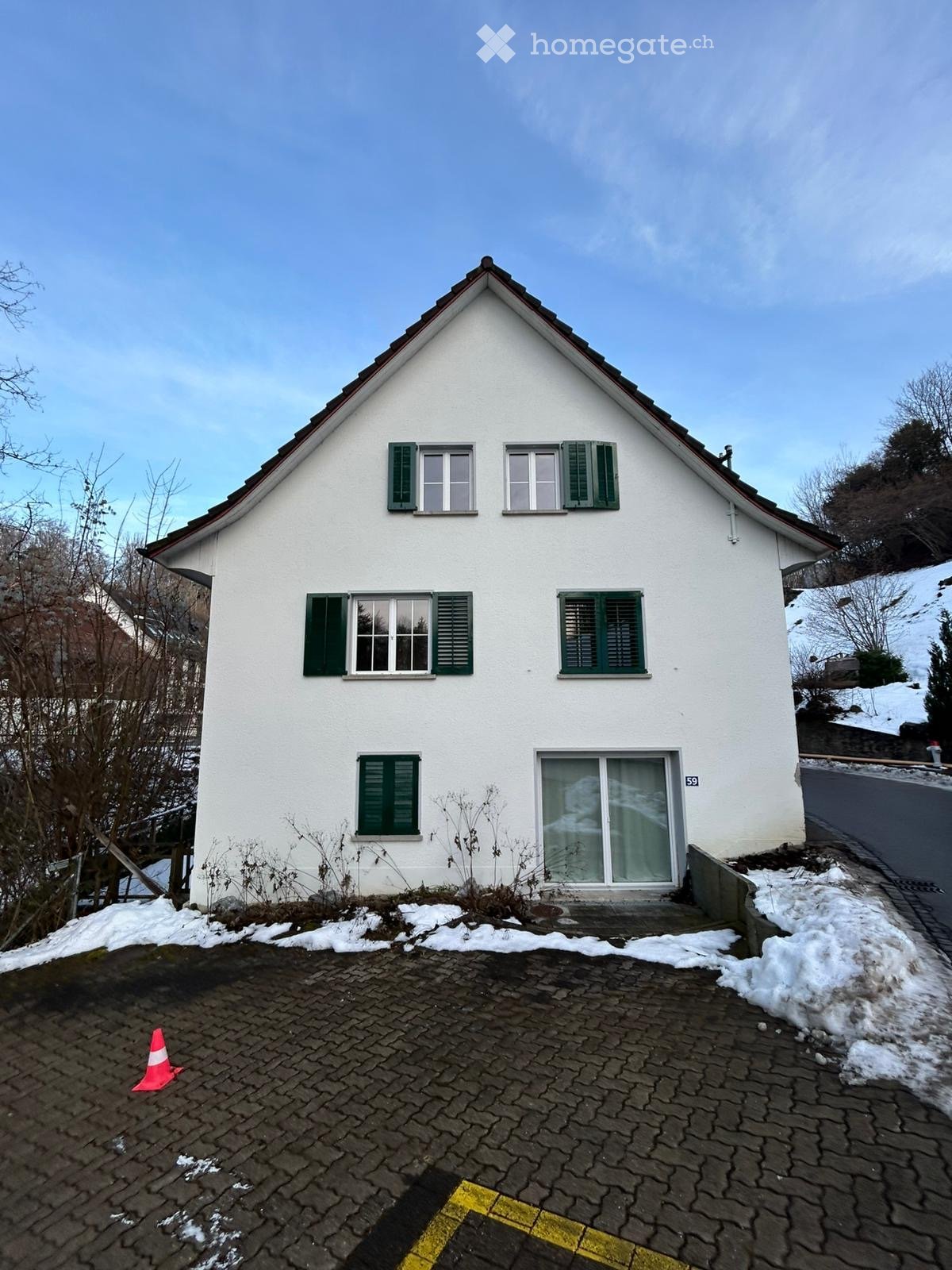 White house, 3 windows, entrance, parking place