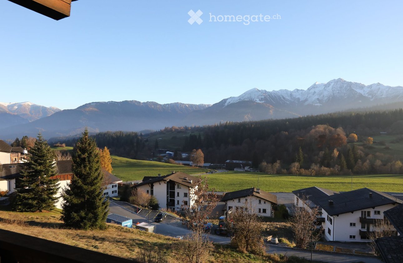 view from the terrace of the houses in a small village surrounded by mountains