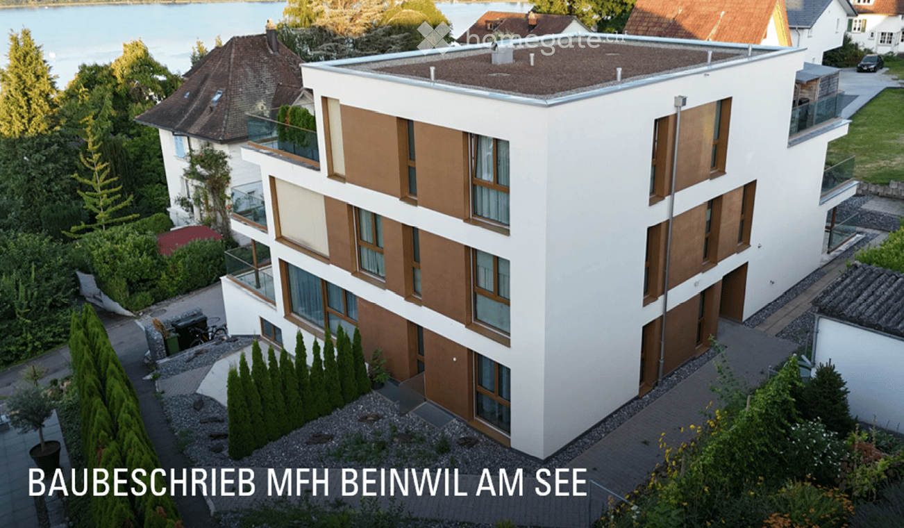 4 story building, white walls, brown windows, terrace on upper floors, parking place, sea view