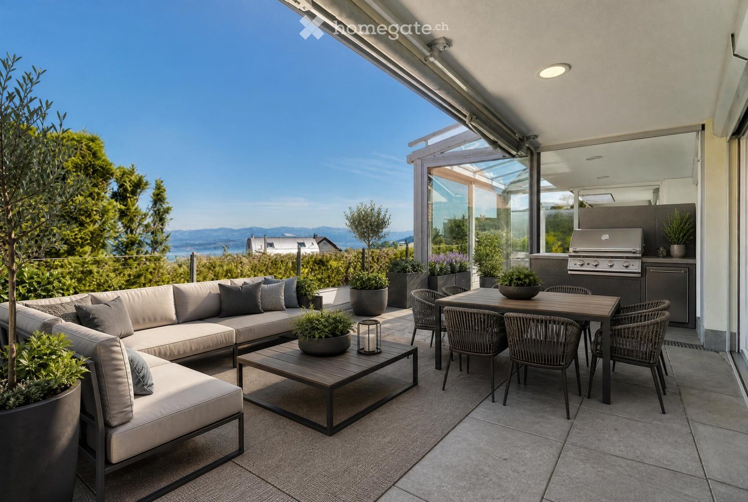 Modern outdoor terrace with a sectional sofa, coffee table, dining table with chairs, grill, and potted plants, overlooking a scenic view.
