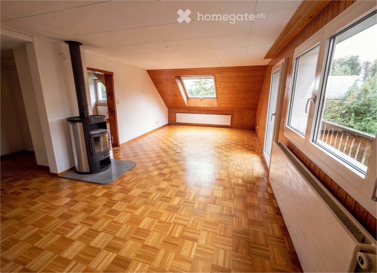 empty room, wooden floor, fireplace, windows, wooden walls, radiator