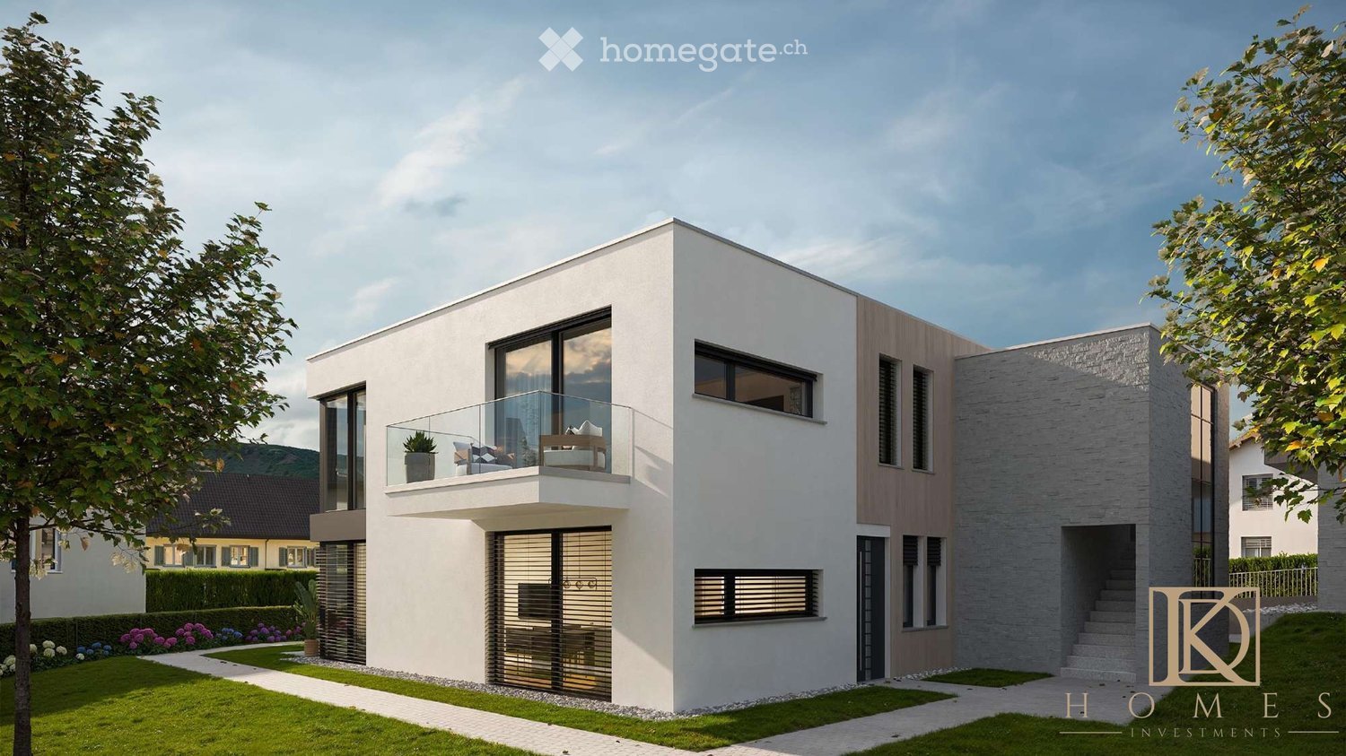 Modern two-story house with white and grey exterior, large windows, and a balcony on the upper floor.