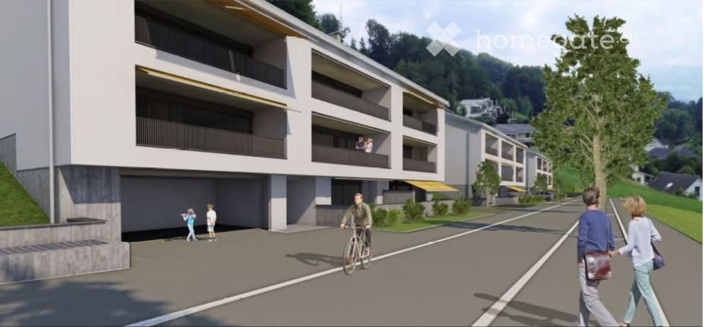 Modern multi-story residential building with balconies, raised ground floor, and integrated garage. People are walking and cycling in front of the building.