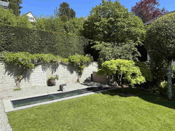 Einfamilienhaus mit Seesicht im Gartenparadies 3