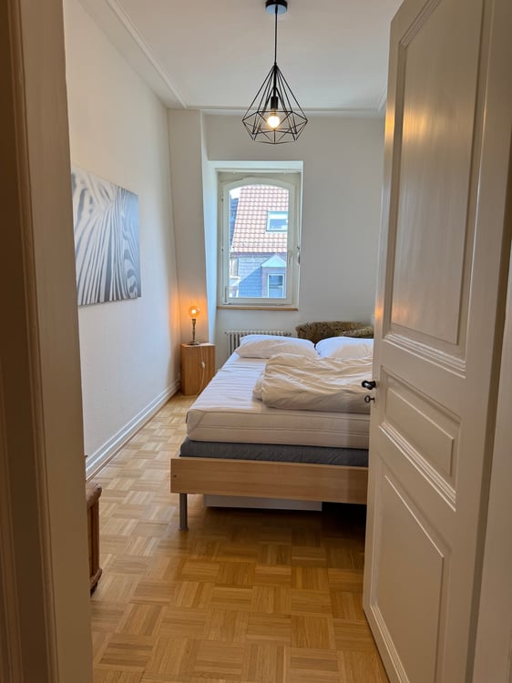 Urbaner Luxus im Gundeli: Loft-Maisonette mit historischem Charme 12
