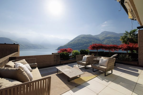 Eine Perle am Lago di Lugano – Terrassenwohnung mit unverbaubarer 180°-Seesicht 1