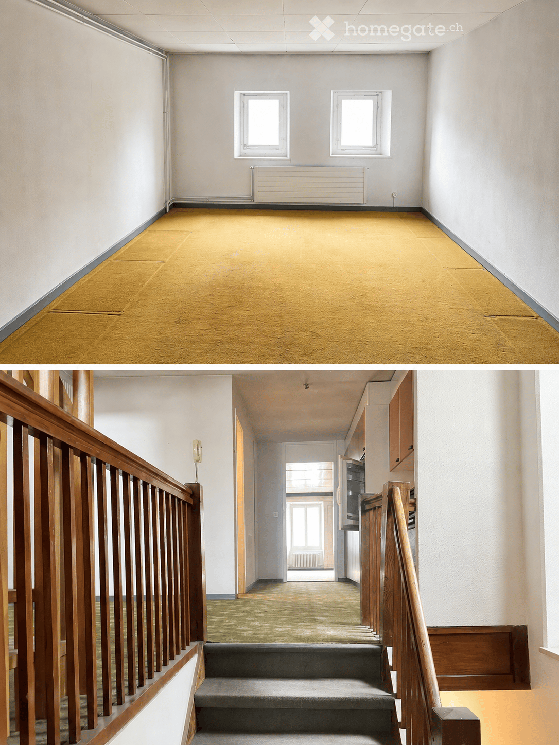 Empty hallway with beige walls, yellow carpet, two windows, radiator, and wooden staircase with handrails.