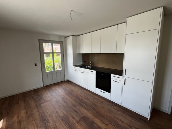 Erstbezug in historischer Villa: Charmante 2-Zimmerwohnung mit Sitzplatz 2