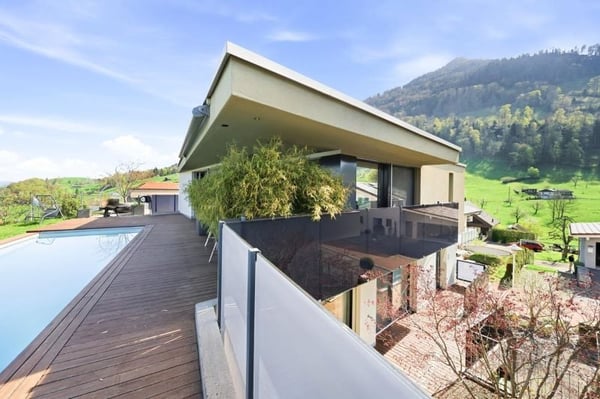 Modernes 5-Zimmer-Einfamilienhaus mit Pool und Seeblick in Greppen 14